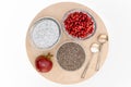 Chia seed pudding with pomegranate seeds close up on wooden board on white background Royalty Free Stock Photo