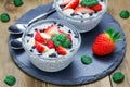 Chia seed pudding with strawberries, almond and chocolate cookie crumbs Royalty Free Stock Photo