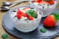 Chia seed pudding with strawberries, almond, chocolate cookie crumbs Royalty Free Stock Photo