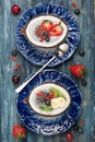 Chia seeds coconut pudding with berries and fruit.