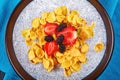 Chia seeds, Corn flakes, strawberries, mulberries Royalty Free Stock Photo