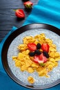 Chia seeds, Corn flakes, strawberries, mulberries Royalty Free Stock Photo