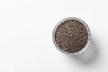 Chia seeds in a cup beautifully laid out on a white background. Top view. copy space.. Vegetarian food Royalty Free Stock Photo