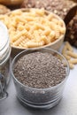 Chia seeds and different gluten free products on white table Royalty Free Stock Photo