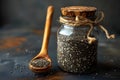 Chia Seeds Elegance: Wooden Spoon & Glass Jar Contrast. Concept Food Photography, Styling Tips, Royalty Free Stock Photo
