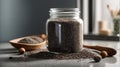 Chia seeds in a glass jar on a concrete background. Clean eating, vegan, balanced