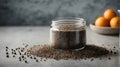 Chia seeds in a glass jar on a concrete background. Clean eating, vegan, balanced