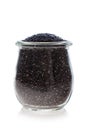 Chia seeds in glass jar isolated on white background. Healthy superfood Royalty Free Stock Photo