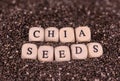 Chia seeds inscription on a background of chia seeds. Selective focus. Royalty Free Stock Photo