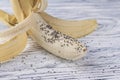 Chia seeds piled on peeled banana