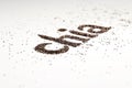 Chia word made from chia seeds Salvia hispanica on white background. Royalty Free Stock Photo