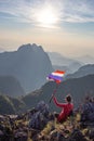 Asian trekking woman holding Thailand flag Royalty Free Stock Photo
