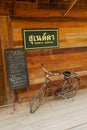 Old bicycle at the entrance to one of the hostels in Chiang Khan, Thailand.