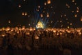 Chiang Mai lantern festival with lantern flying on the sky and crowd of people who is going to release the lanterns