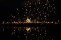 Chiang Mai lantern festival with lantern flying on the sky and crowd of people who is going to release the lanterns