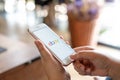 CHIANG MAI, THAILAND - Apr.27,2019: Woman holding Apple iPhone 6S Rose Gold with eBay apps on the screen. Royalty Free Stock Photo