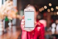 CHIANG MAI, THAILAND - Apr.08,2019: Woman holding Apple iPhone 6S Rose Gold with  Grab apps on screen. Royalty Free Stock Photo