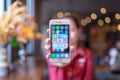 CHIANG MAI, THAILAND - Apr.08,2019: Woman holding Apple iPhone 6S Rose Gold with icons of social media on screen. Social media are Royalty Free Stock Photo