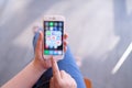 CHIANG MAI, THAILAND - Apr.08,2019: Woman holding Apple iPhone 6S Rose Gold with icons of social media on screen. Royalty Free Stock Photo