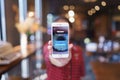 CHIANG MAI, THAILAND - Apr.08,2019: Woman holding Apple iPhone 6S Rose Gold with Vimeo on screen. Vimeo is a video-sharing