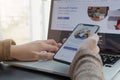 CHIANG MAI, THAILAND - APR 11, 2020 : A working from home employee is downloading the Microsoft Teams social platform, ready for