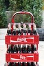 Chiang Mai, Thailand - December 23, 2017: Glass Coca-Cola bottles in red plastic boxes.