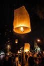 Chiang Mai, Thailand - December 31, 2017: People in crowds are launching sky lanterns, flying lanterns, floating lanterns, hot-air Royalty Free Stock Photo