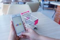 CHIANG MAI, THAILAND - Feb 22,2018: Woman holding Apple iPhone 6S Rose Gold with eBAY apps and shopping cart. Online shopping via Royalty Free Stock Photo