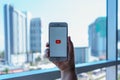 CHIANG MAI, THAILAND - Feb 22,2018: Woman holding Apple iPhone 6S Rose Gold with Youtube apps on screen. YouTube is the popular