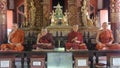 CHIANG MAI, THAILAND - FEBRUARY 19. 2013: Wax statues of meditating monks in the Wat Phra Singh Buddhist temple in Chiangmai, Tha