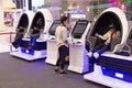 Children enjoy playing with the VR game machines Royalty Free Stock Photo