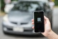 CHIANG MAI,THAILAND - JULY 24,2016 : A woman hand holding Uber a Royalty Free Stock Photo