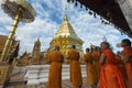 Chiang Mai, Thailand - Jun 17, 2017: Monks and novices praying to Phra That Doi Suthep Royalty Free Stock Photo