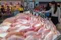 Many fresh raw red tilapia fish on ice in supermarket for seller at Chiang Mai. Thailand