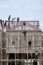 CHIANG MAI, THAILAND - 10 JUNE, 2023 : The Roofer working on roof structure on real estate construction site.