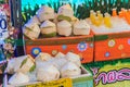 Chiang Mai, Thailand - May 3, 2017: Peeled young coconuts on ice Royalty Free Stock Photo