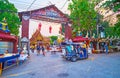 Tuk tuk taxi at the Silver Temple gate, Chiang Mai, Thailand Royalty Free Stock Photo