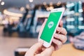 CHIANG MAI, THAILAND - May.10,2019: Woman holding Apple iPhone 6S Rose Gold with LINE apps on screen at shopping center. Royalty Free Stock Photo