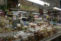 Chiang Mai, Thailand, November 07, 2018: Cropped image of handsome man with a market basket doing shopping at the supermarket