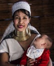 Portrait of longneck tribe woman and her baby looking at her mother face in Chiang Mai lock neck village, Chiang Mai, Thailand Royalty Free Stock Photo