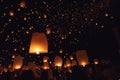 Chiang Mai - Thailand November 27, 2023 : Tourists happily celebrate releasing lanterns at the Loi Krathong Yi Peng Lantern