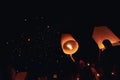 Chiang Mai - Thailand November 28, 2023 : Tourists happily celebrate releasing lanterns at the Loi Krathong Yi Peng Lantern