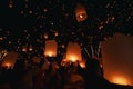 Chiang Mai - Thailand November 27, 2023 : Tourists happily celebrate releasing lanterns at the Loi Krathong Yi Peng Lantern