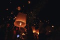 Chiang Mai - Thailand November 28, 2023 : Tourists happily celebrate releasing lanterns at the Loi Krathong Yi Peng Lantern