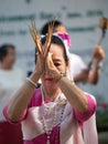 Chiang Mai, Thailand - October 25, 2020: Northern Thai traditional dancer in Lanna traditional dress with long finger brass