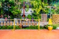 CHIANG MAI, THAILAND - 4.11.2019: Tourist light a candle in temple Wat Phra Singh, Chiang Mai city, Thailand. Candles are placed Royalty Free Stock Photo