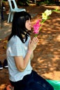 Chiang Mai, Thailand: Woman Kneeling in Prayer
