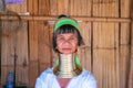Long Neck Karen woman smiling at hill tribe villages, Chiang Rai Province, Thailand