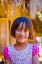 CHIANG RAI, THAILAND - FEBRUARY 01, 2018: Close up of unidentified smiling little girl belongs to a Karen Long Neck hill Royalty Free Stock Photo