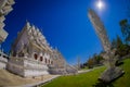 CHIANG RAI, THAILAND - FEBRUARY 01, 2018: Indoor view of unidentified people taking pictures of the ornate white temple